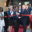 Mayor J. Christian Bollwage, council members, reenactors, Jennifer Costa, Rev. Dr. Wanda M. Lundy, and community leaders cut the ribbon at the Welcome Station grand opening in Elizabeth NJ