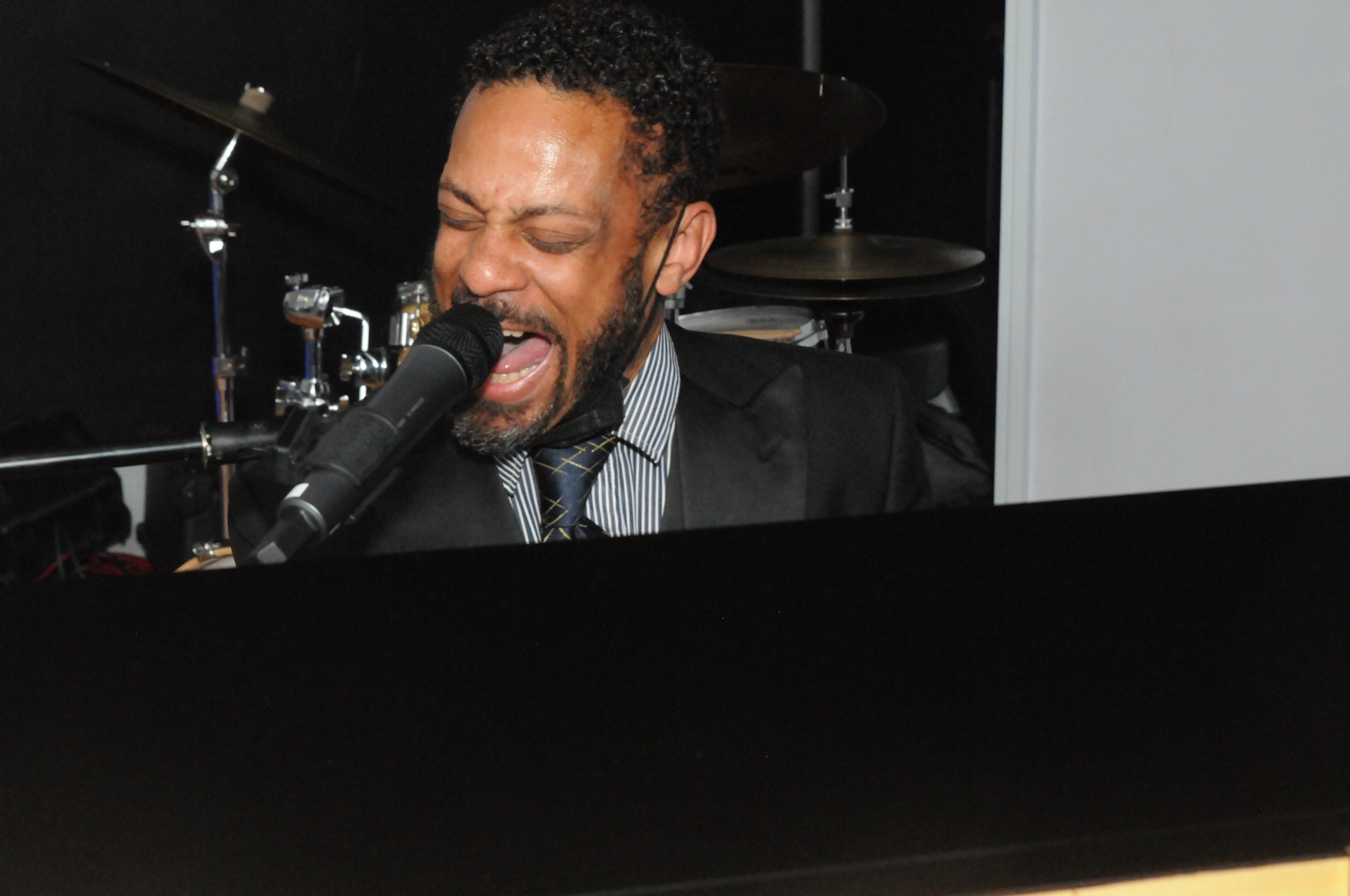 Entertainer performs at the 313+ Ancestors Speak Project Gala at Snyder Academy in 2022.