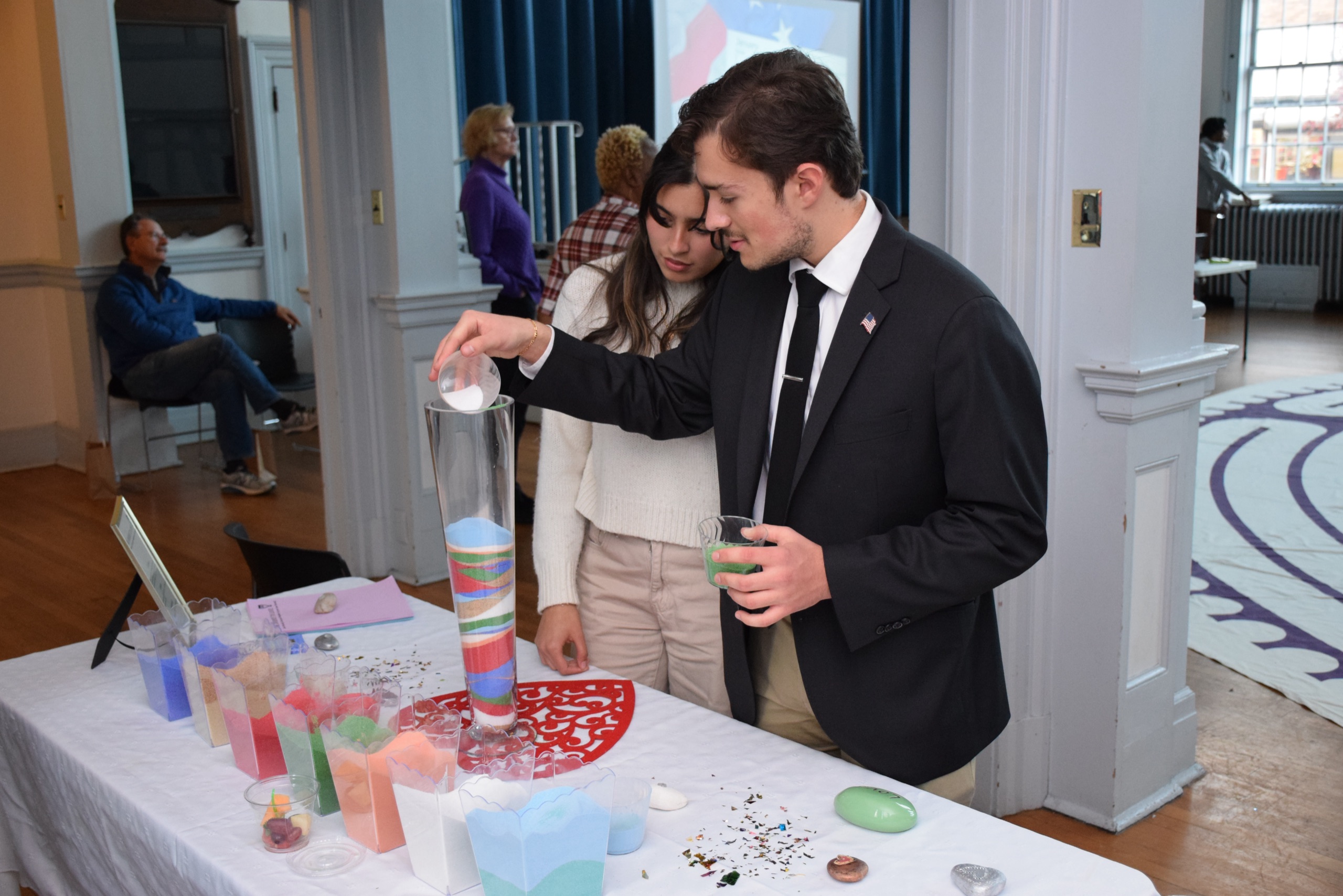 Attendees take part in a hands-on activity during Journey to Love 2024 at Snyder Academy.