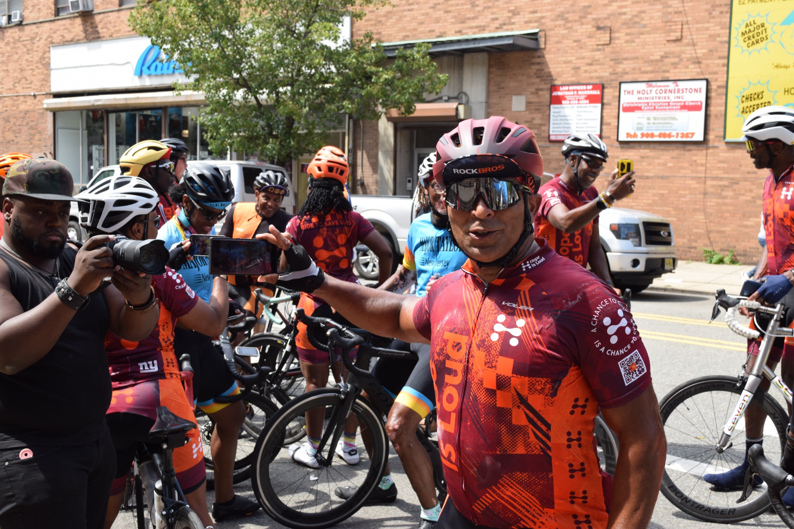 Cyclists gather outside Snyder Academy during Hope Is Loud in 2022.