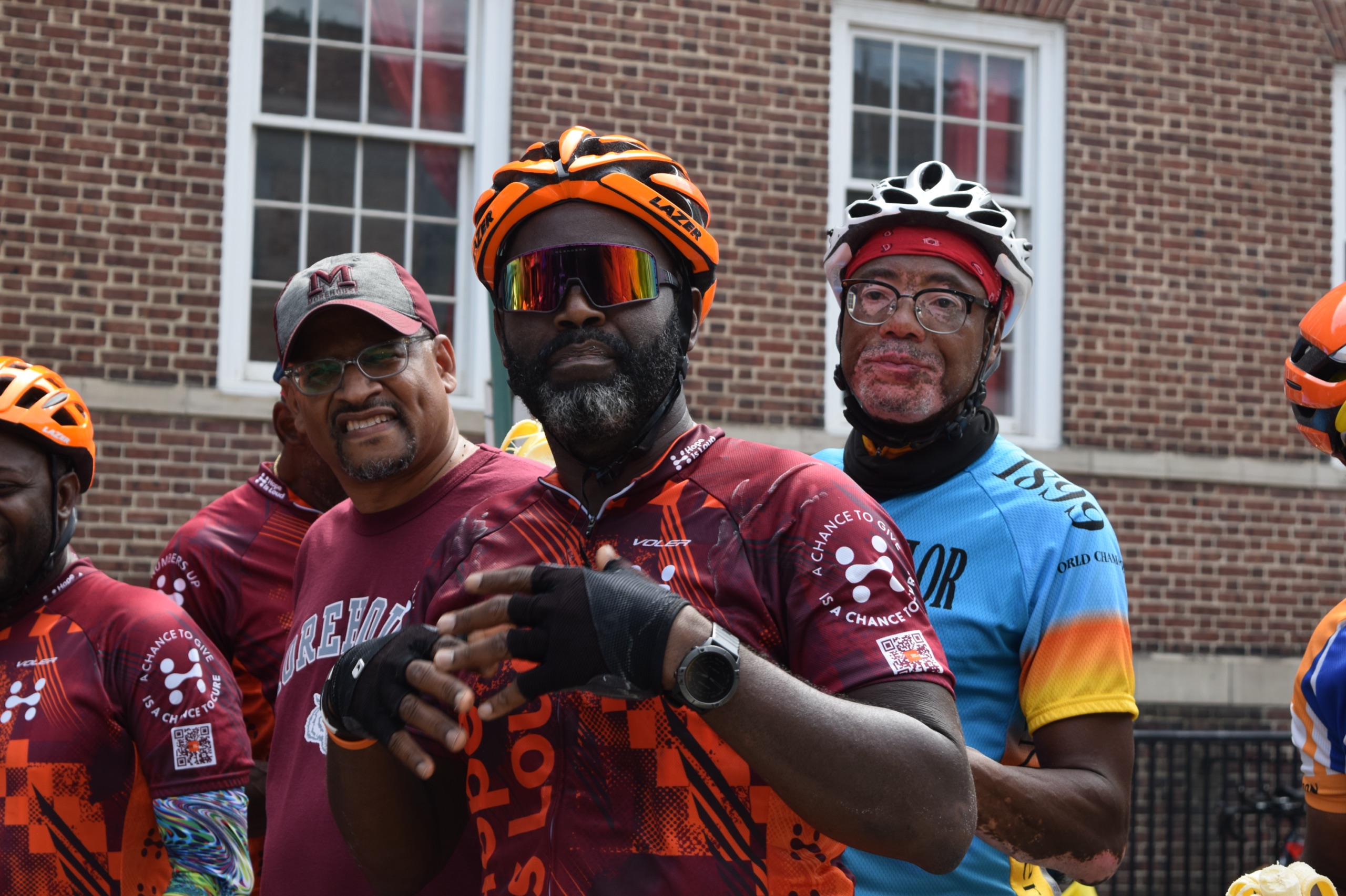 Cyclists gather in front of Snyder Academy during Hope Is Loud in 2022.
